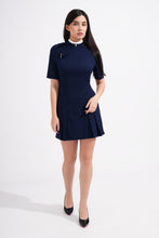 Load image into Gallery viewer, Woman wearing a navy blue dress on a white background