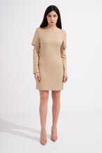 Load image into Gallery viewer, Woman wearing a beige dress on a white background