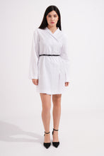 Load image into Gallery viewer, Woman wearing a white dress with a black belt on a white background