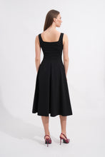 Load image into Gallery viewer, Woman wearing a black dress on a white background

