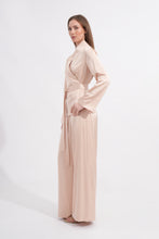 Load image into Gallery viewer, Woman wearing a light beige outfit on a white background

