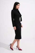 Load image into Gallery viewer, Woman wearing a black dress 
