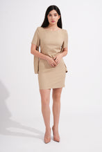 Load image into Gallery viewer, Woman wearing a beige dress on a white background
