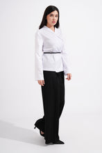 Load image into Gallery viewer, Woman wearing a white blouse and black pants on a white background

