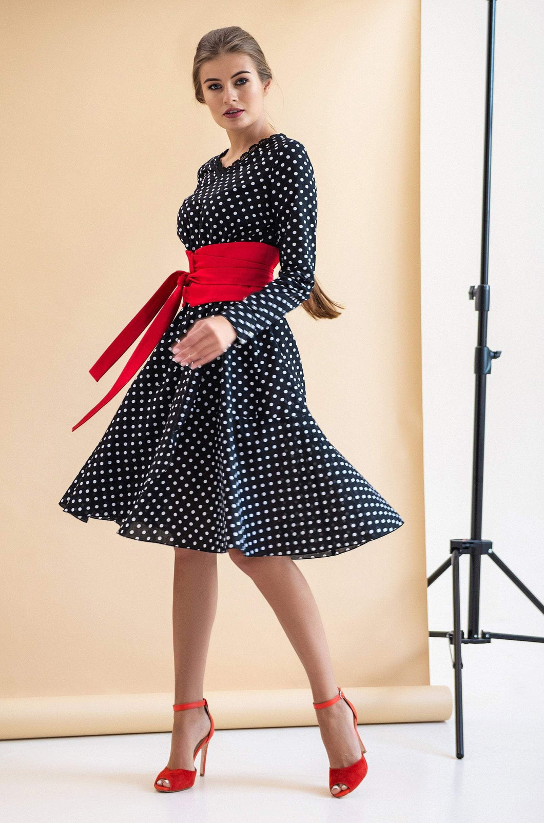 Polka dot long sleeve cotton dress with wide red satin belt